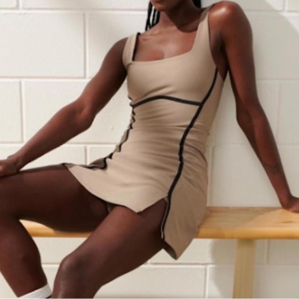 Elegant Cream YPB Sleeveless Dress with Black Accents